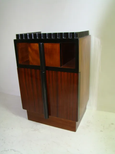 antique bedside table featuring elegant lines and style