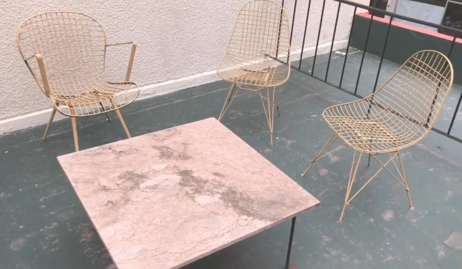 Antique coffee table with elegant design in an outdoor setting