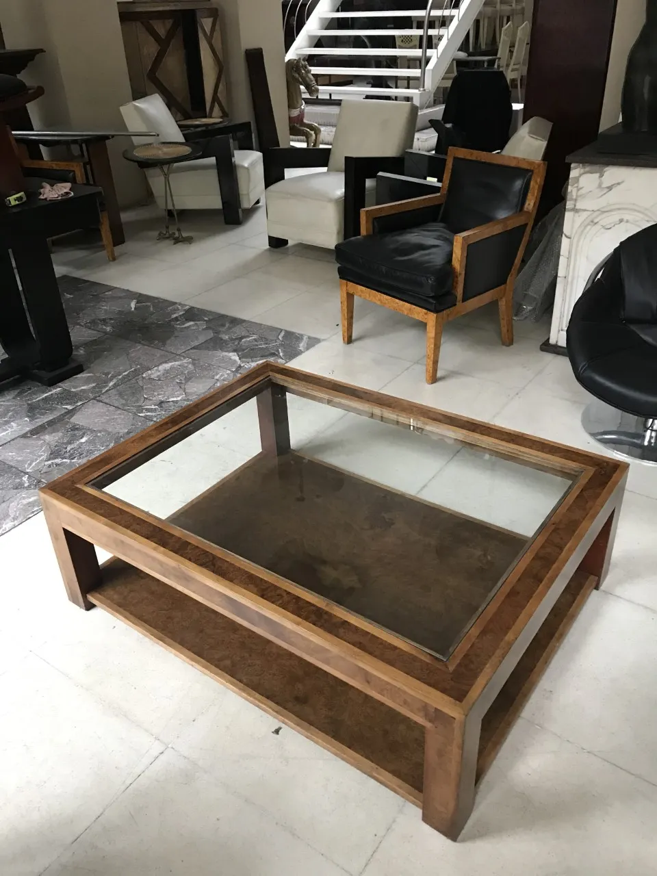 antique coffee table with elegant design in modern setting with chairs