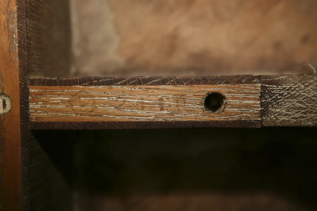 detail of an antique coffee table charlotte perriand showing visible textures in a cozy atmosphere