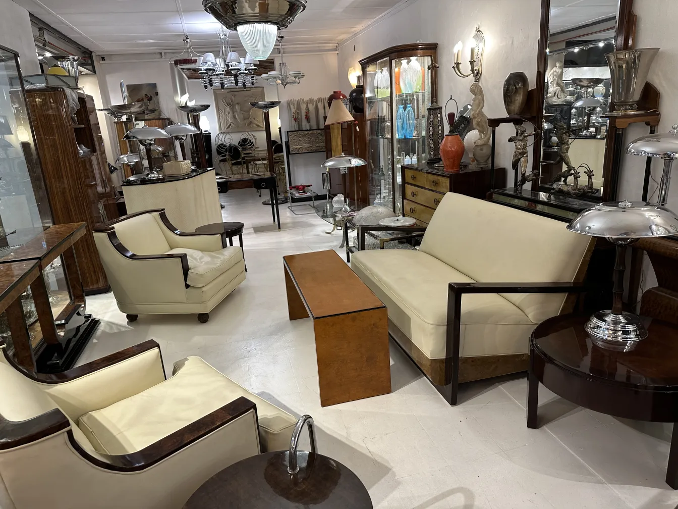Antique coffee table in a stylish living room with various furniture.