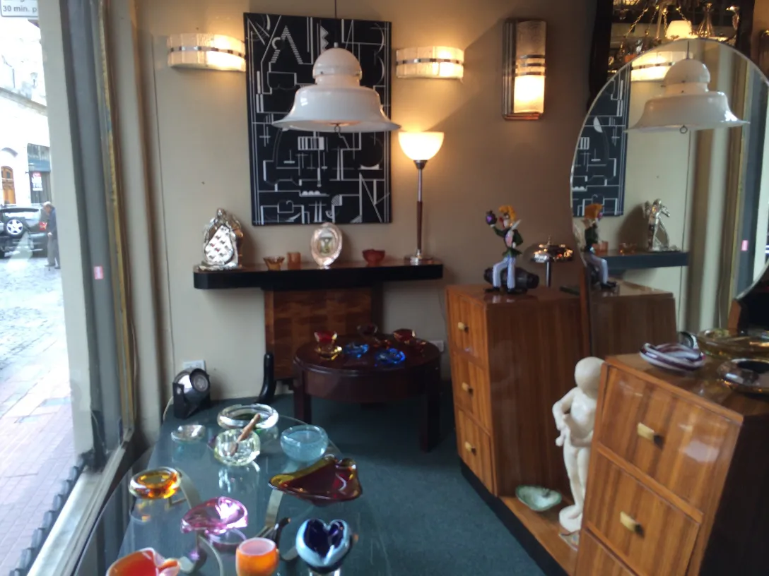 Antique coffee table in a cozy environment with decorative items