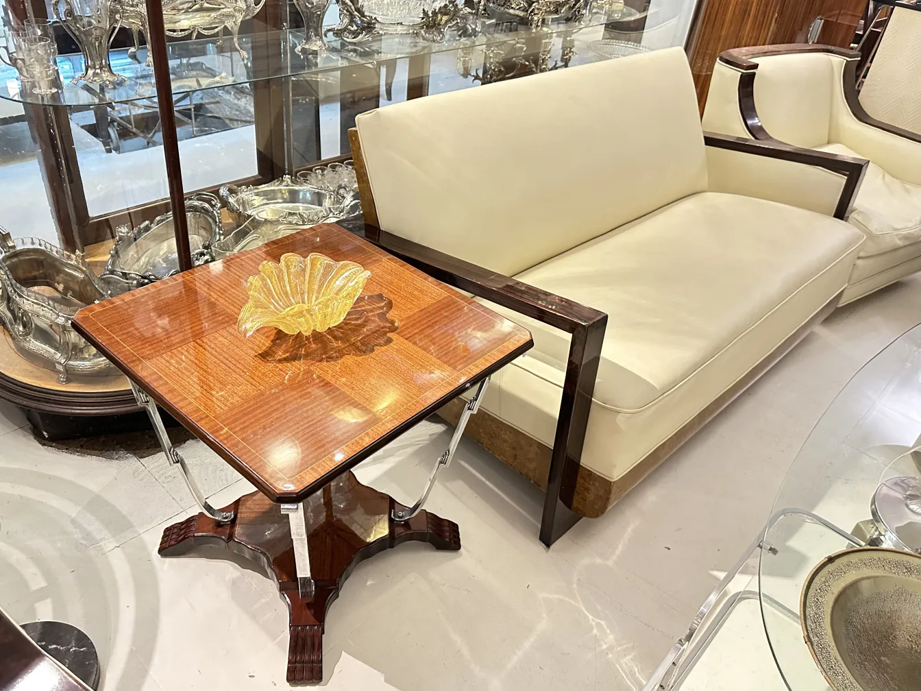 antique small table with classic design and yellow vase