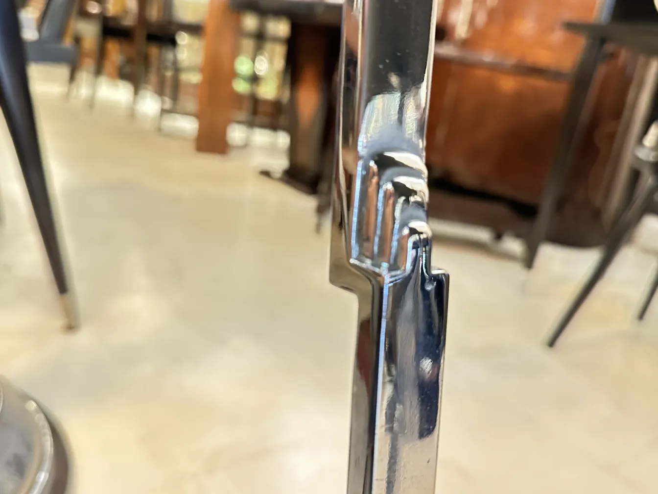 antique small table with a shiny finish in a cozy setting