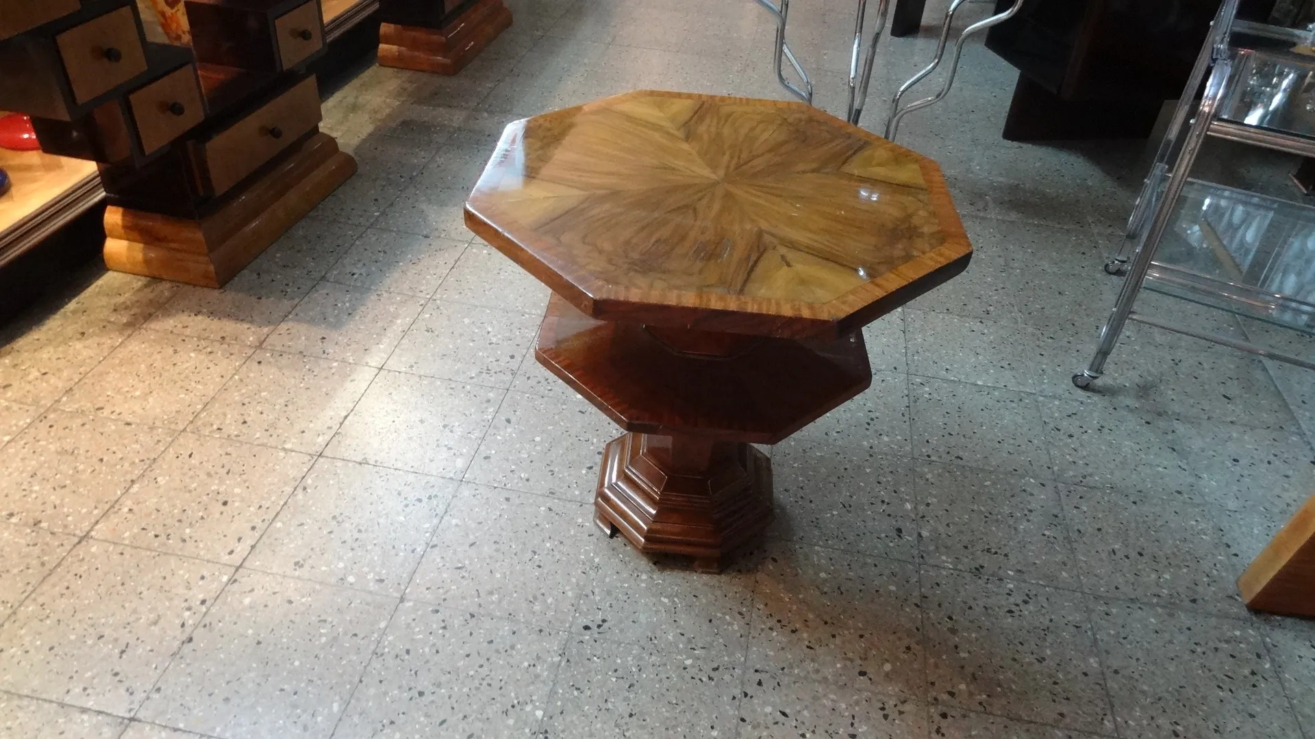 antique octagonal small table with elegant design in a classic setting near other furniture
