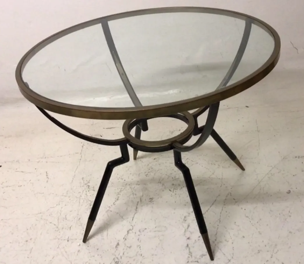 antique small table with elegant legs in a neutral setting