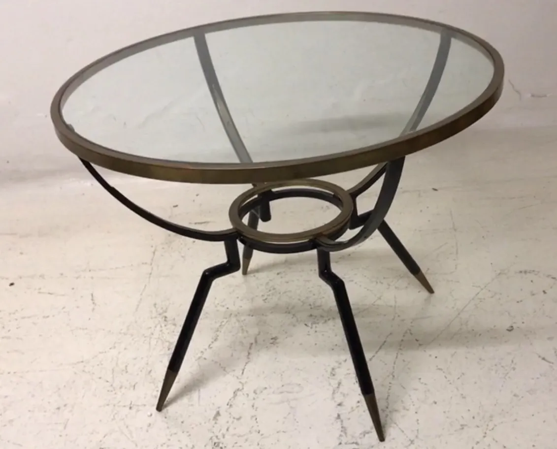 small antique table with stylish legs and glass top