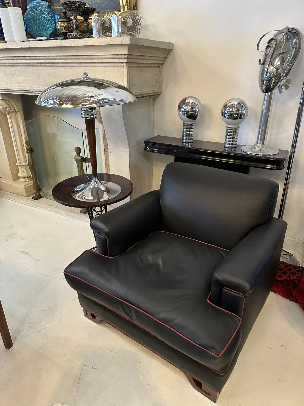 2 antique small tables in a stylish setting with a modern lamp