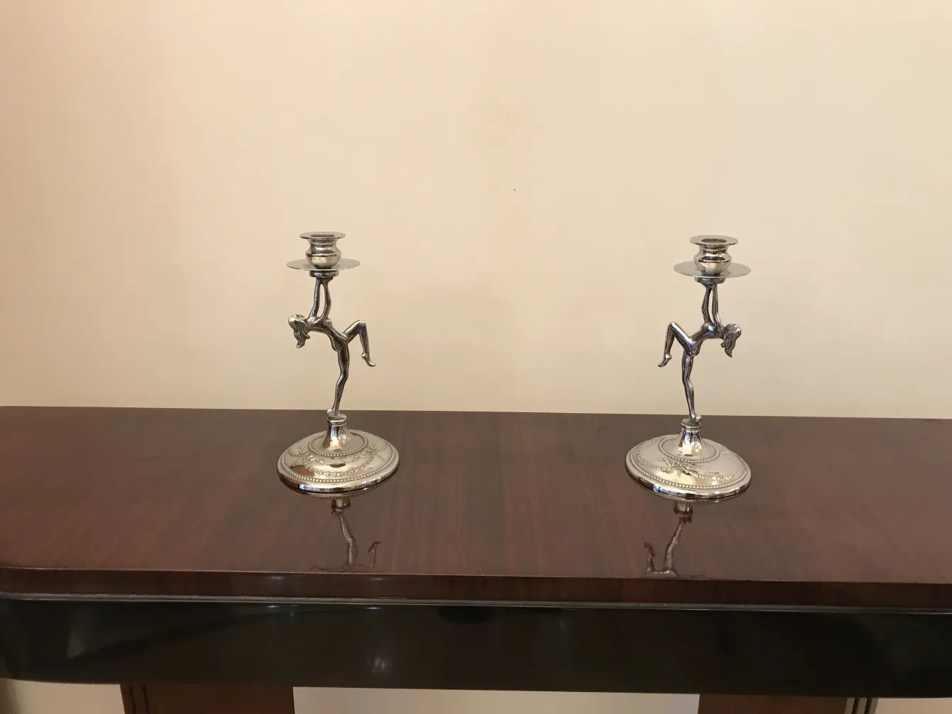 Two antique candelabras with artistic design