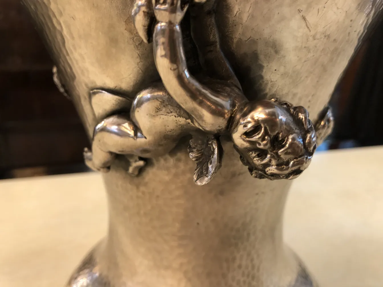 2 antique vases featuring angelic figures