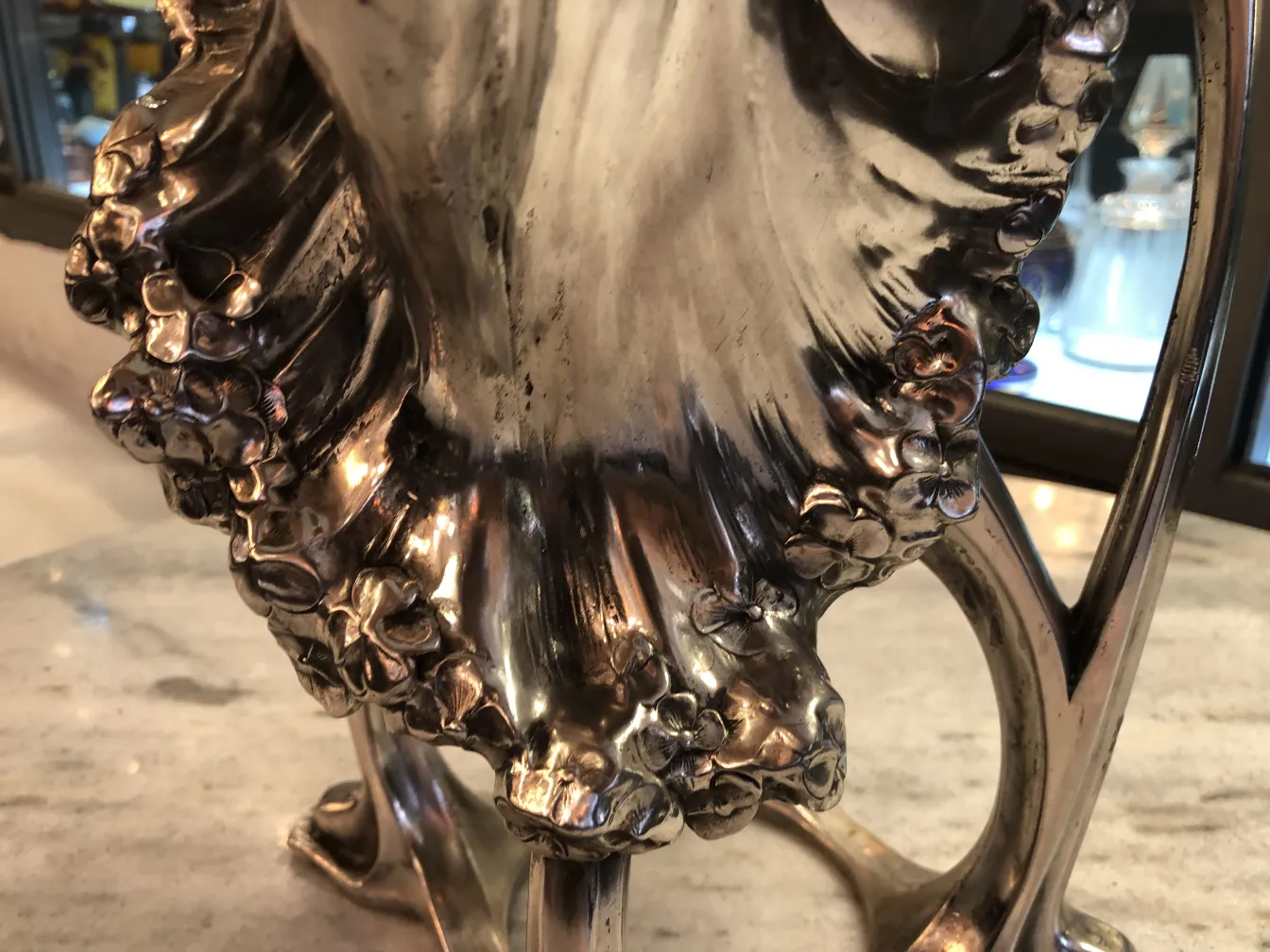 antique vase with floral ornamental details in art nouveau