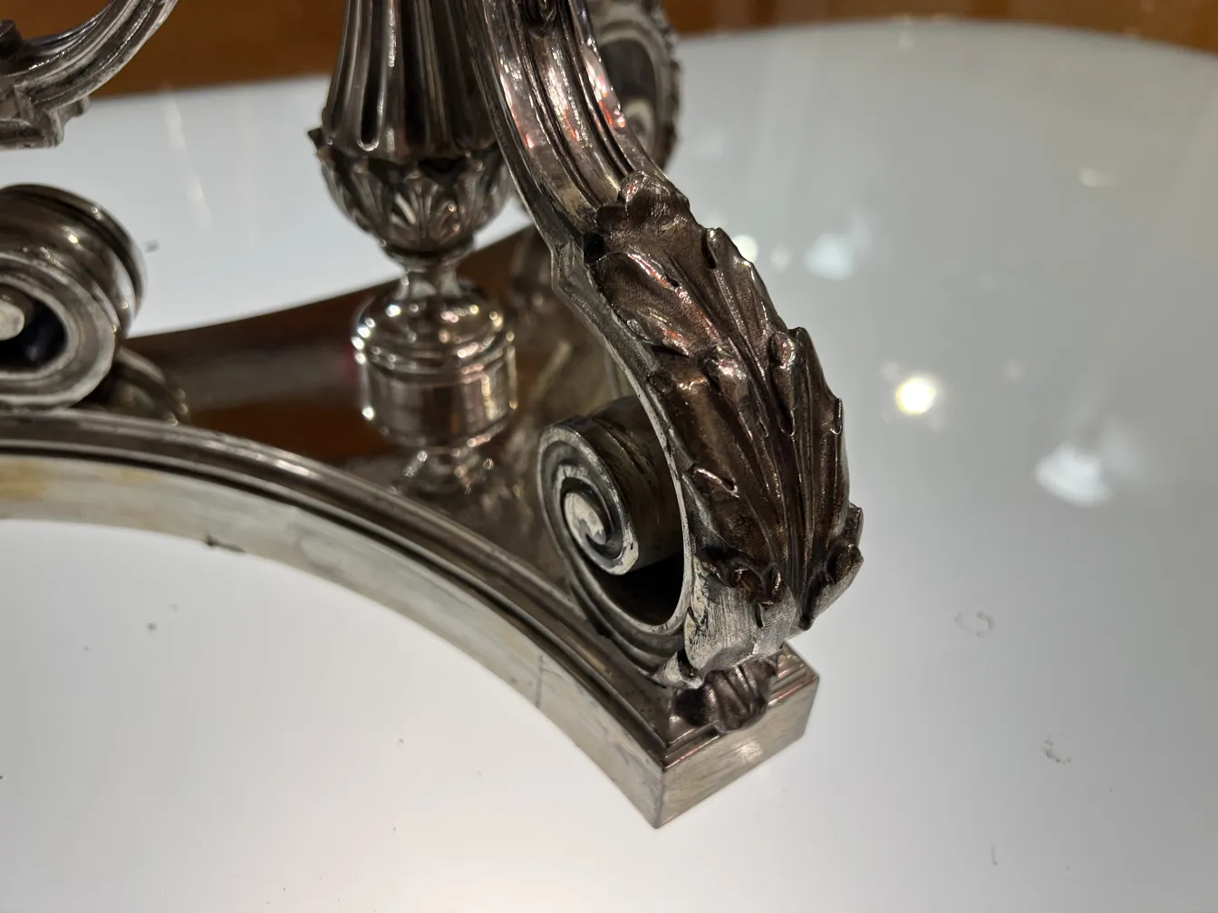 An antique vase with intricate curvy details, art nouveau style