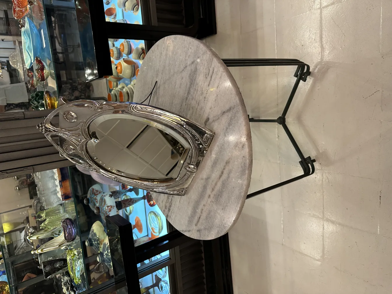 ornate antique mirror with Art Nouveau design