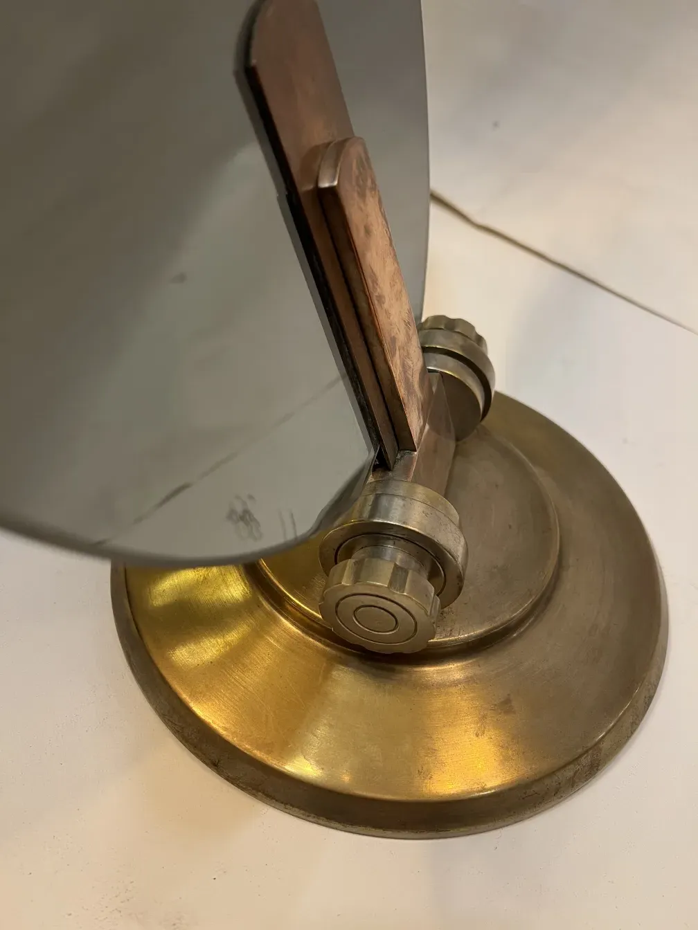 antique mirror with golden metal frame and classic design