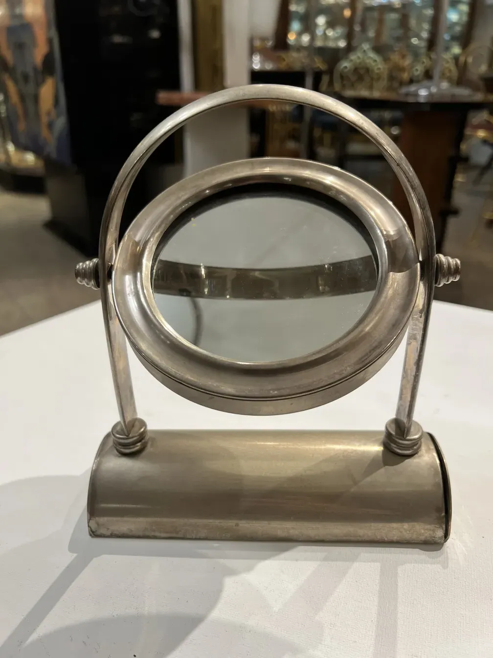 antique mirror with an old style stand