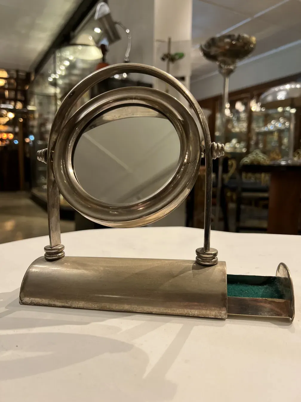 antique mirror art nouveau with decorative details in an elegant setting