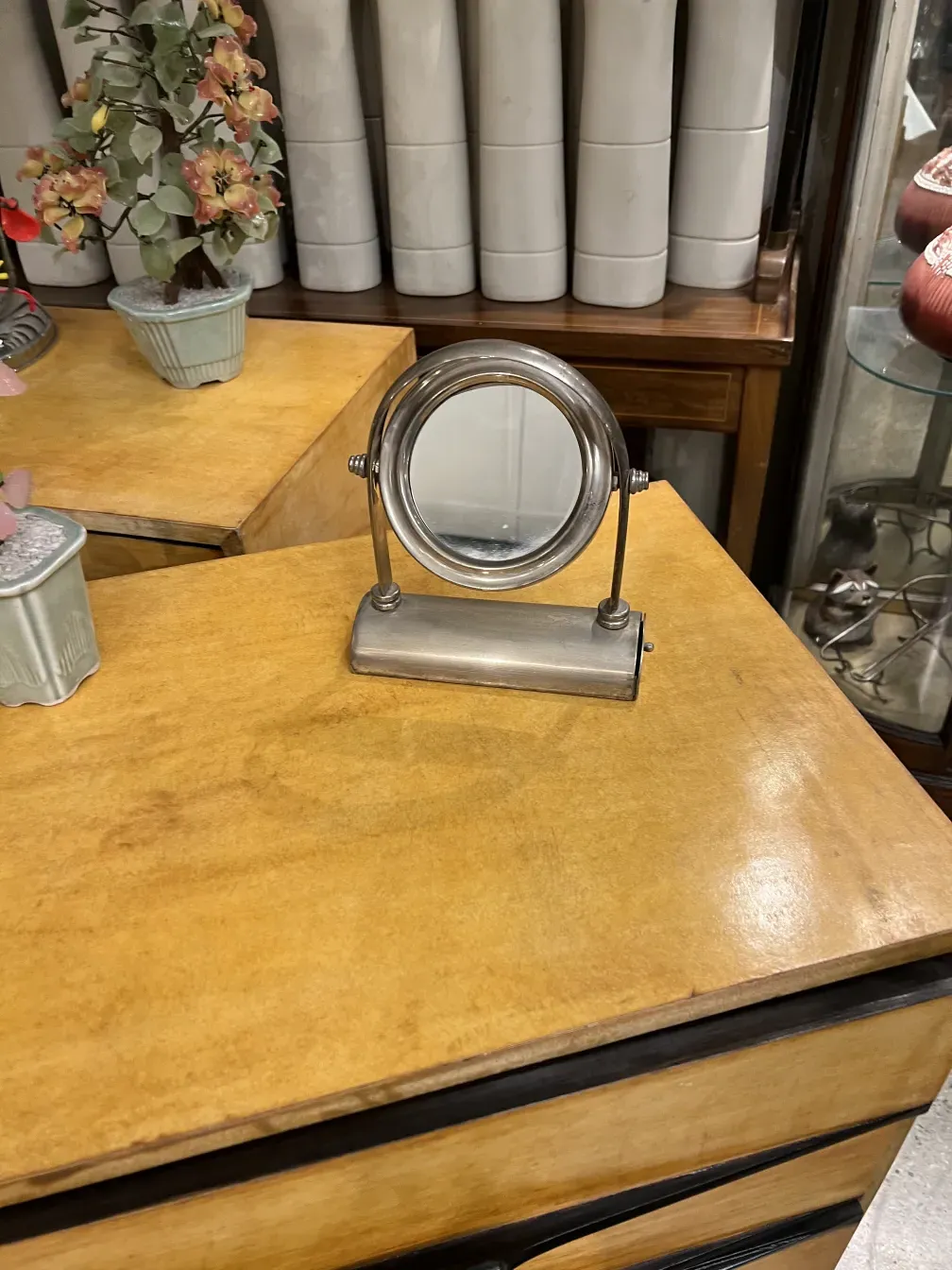 antique mirror with stand in decorative setting