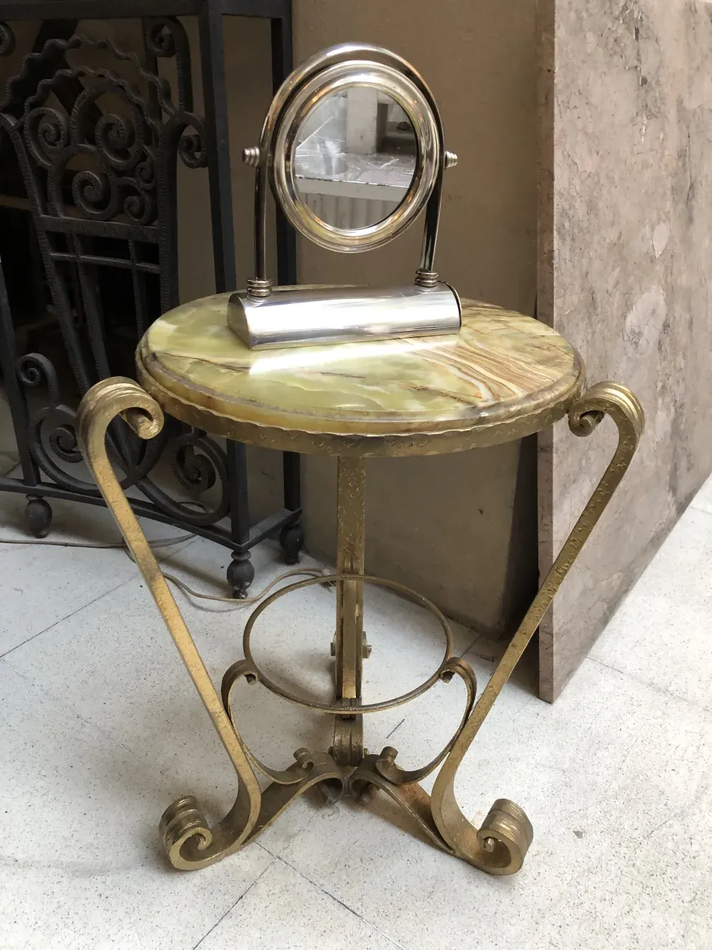 Antique mirror with decorative stand in Art Nouveau style