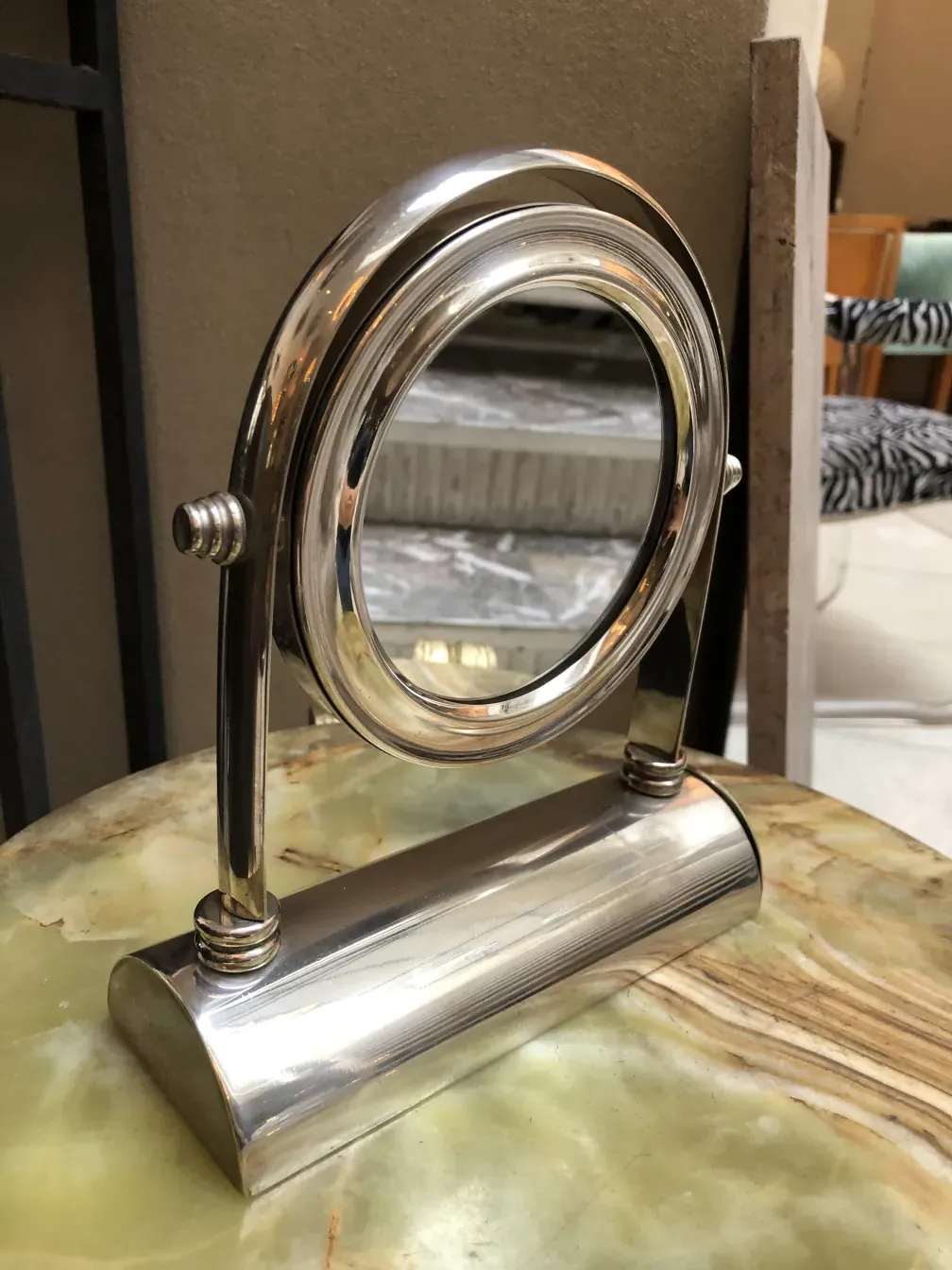 elegant antique mirror with a stylish frame