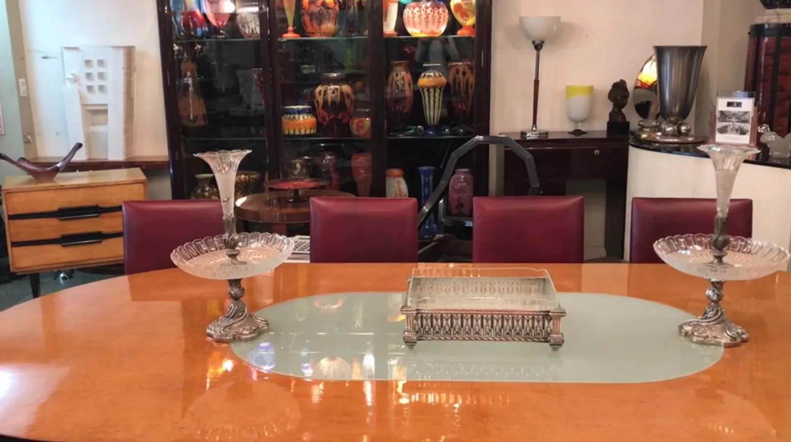 antique Christofle centerpiece on decorative table with vases