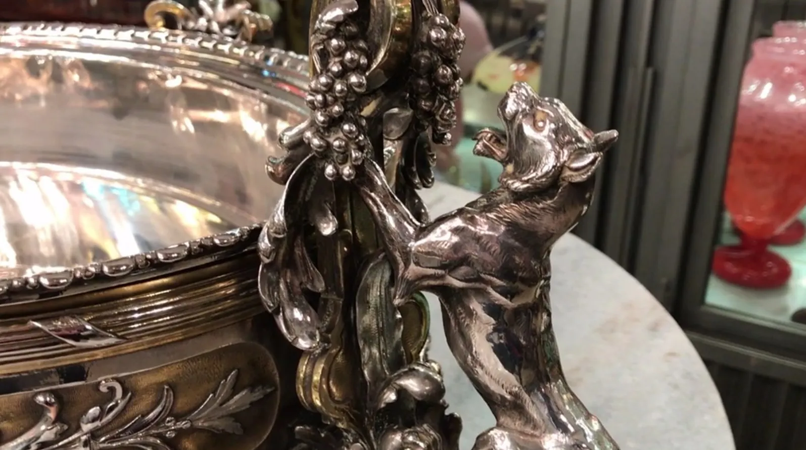christofle centerpiece with ornamental details and animal figure