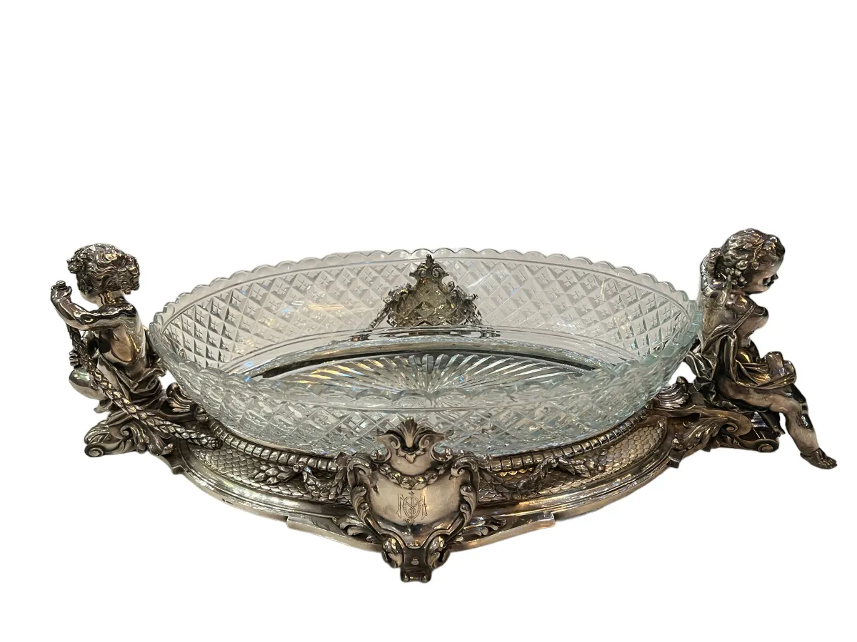 antique centerpiece with ornamental details and figure edges