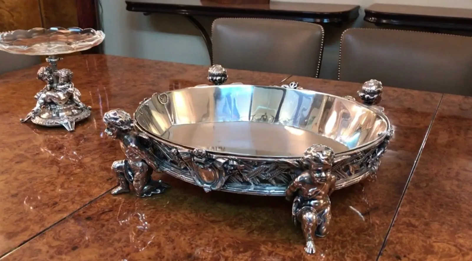 antique centerpiece with cherubs and beautiful decorative details