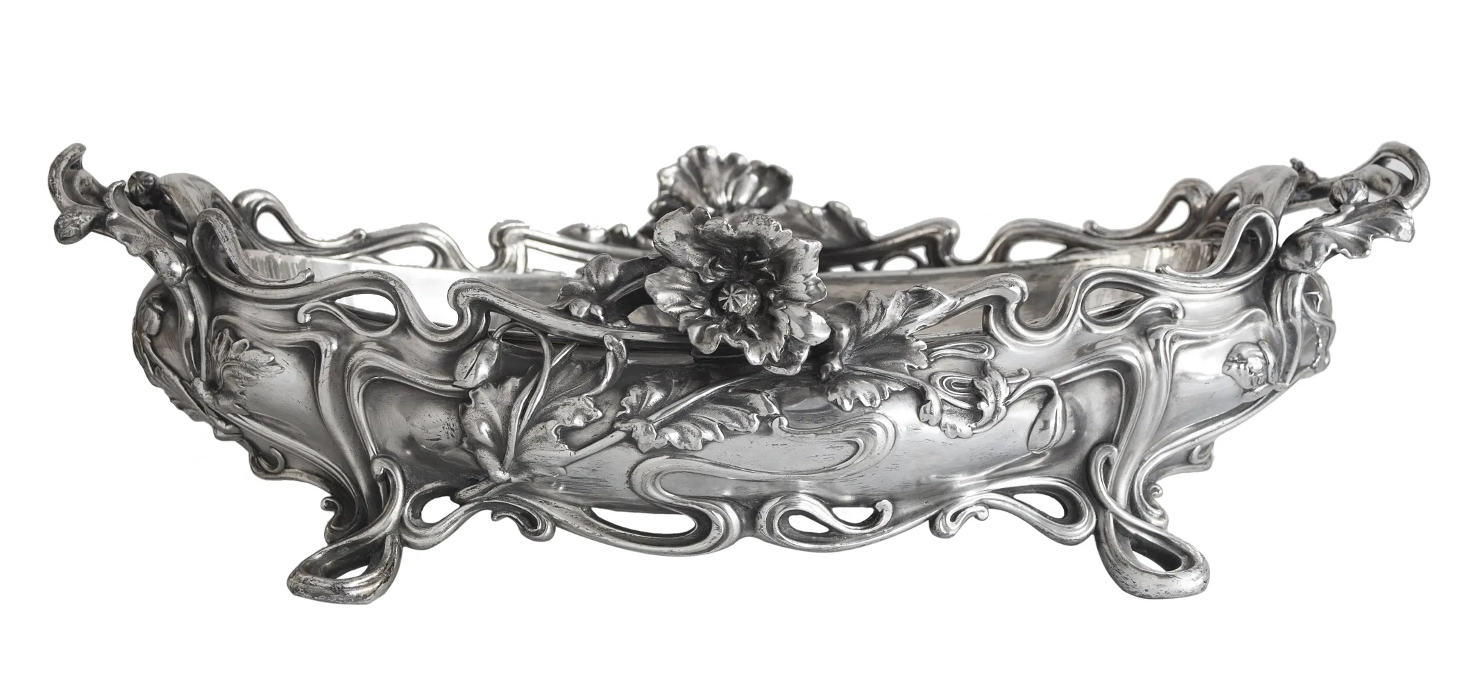 antique centerpiece with floral designs in an elegant setting