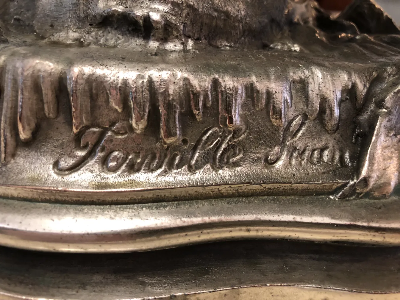 antique centerpiece with decorative metal details