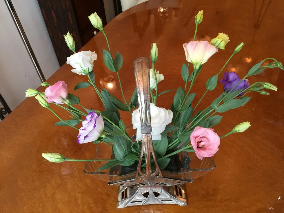 wmfd centerpiece with colorful flowers in a warm setting