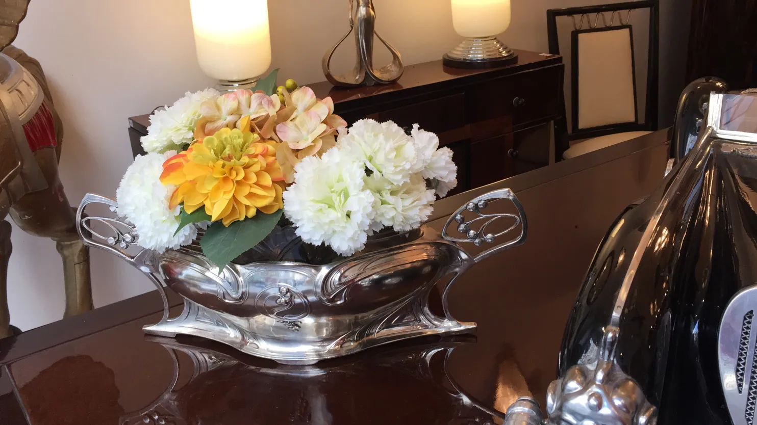 wmf centerpiece with colorful flowers in elegant setting