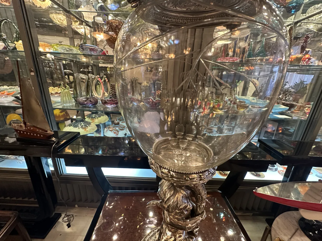 Antique WMF centerpiece, decorative base, viewed in a mix of colors.