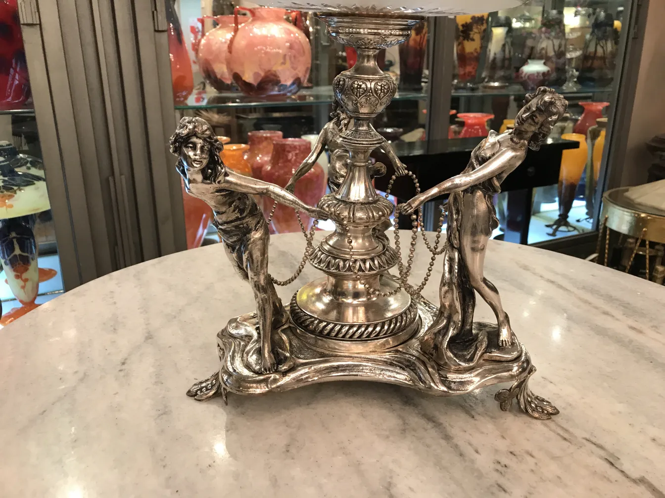 antique WMF centerpiece featuring sculpted figures in metal, elegant and decorative