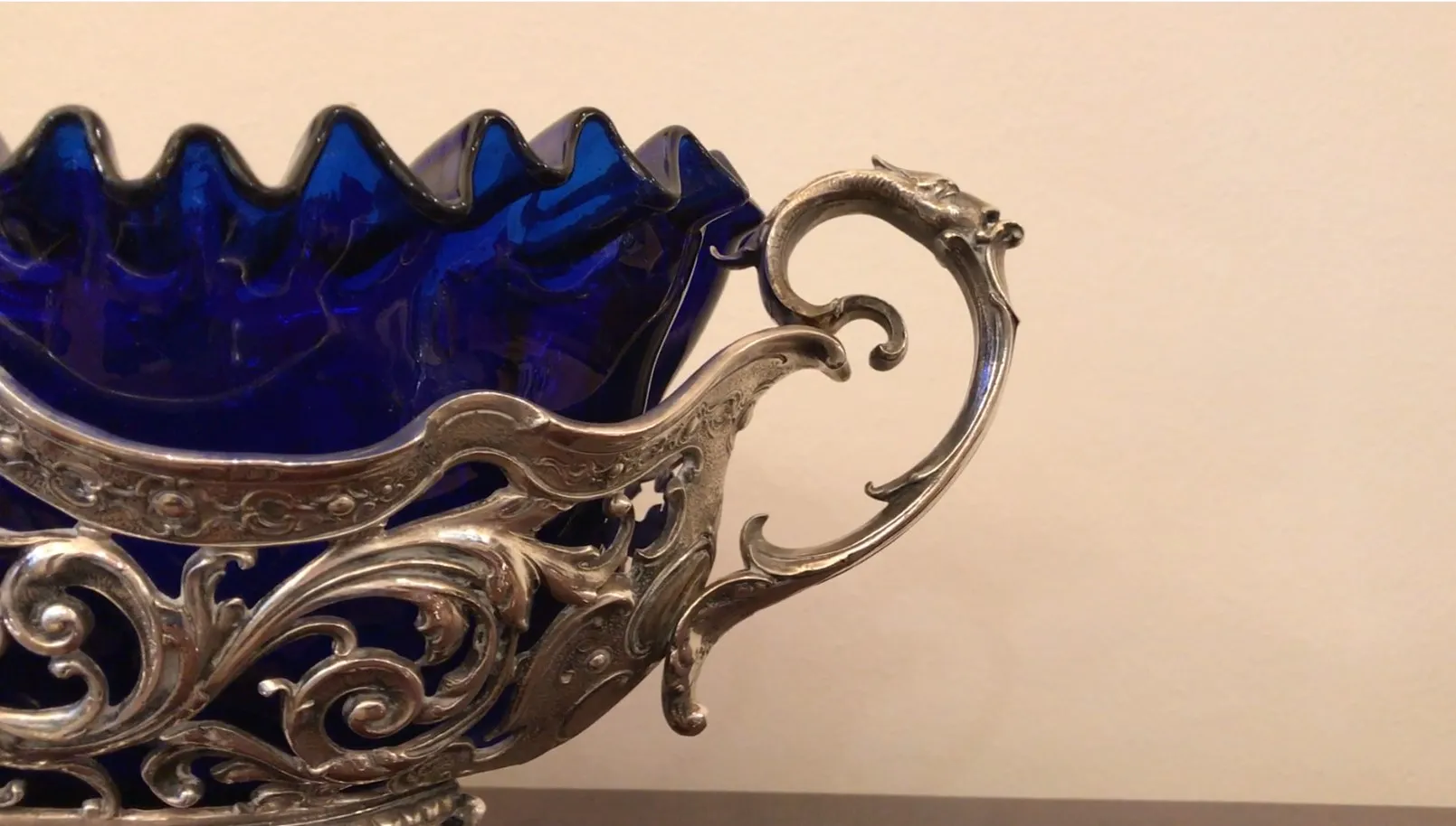 Antique WMF centerpiece with elegant design, blue background