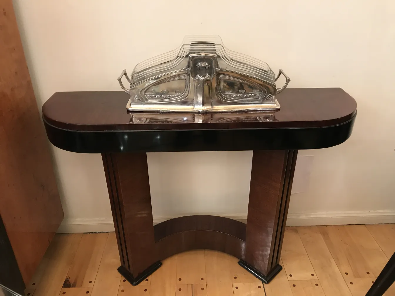 antique WMF centerpiece on dark wood table