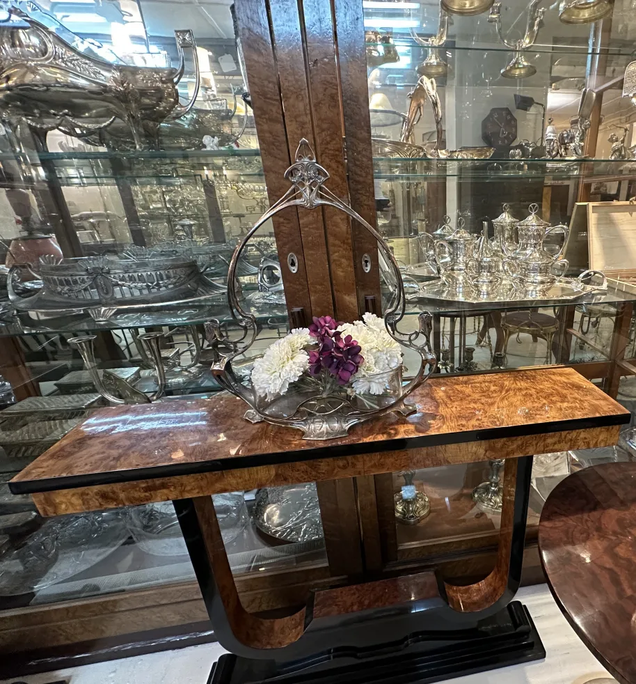 WMF centerpiece with decorative flowers on an elegant display table