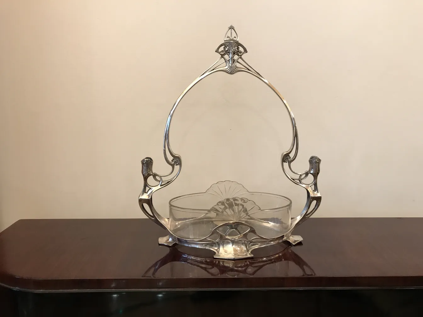 antique WMF centerpiece with decorative handle, elegant design, neutral background