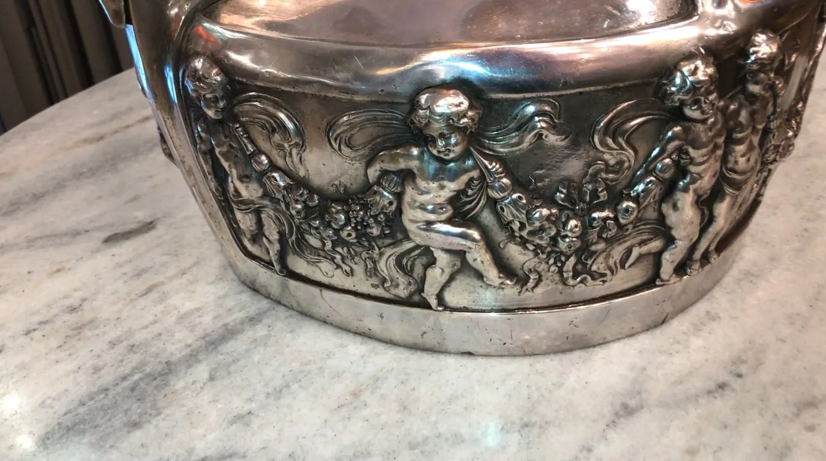 Antique WMF champagne cooler with angel and flower decoration