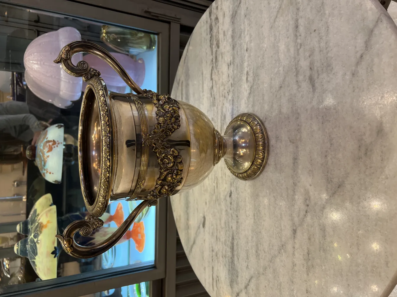 Antique champagne coolers by WMF, featuring elegant design and decorative details