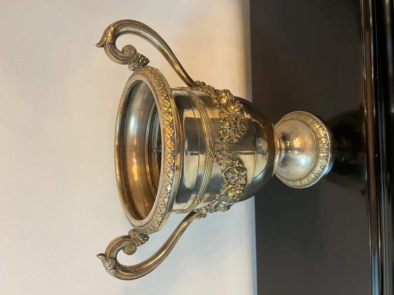 side view of 2 antique champagne coolers WMF with ornate design