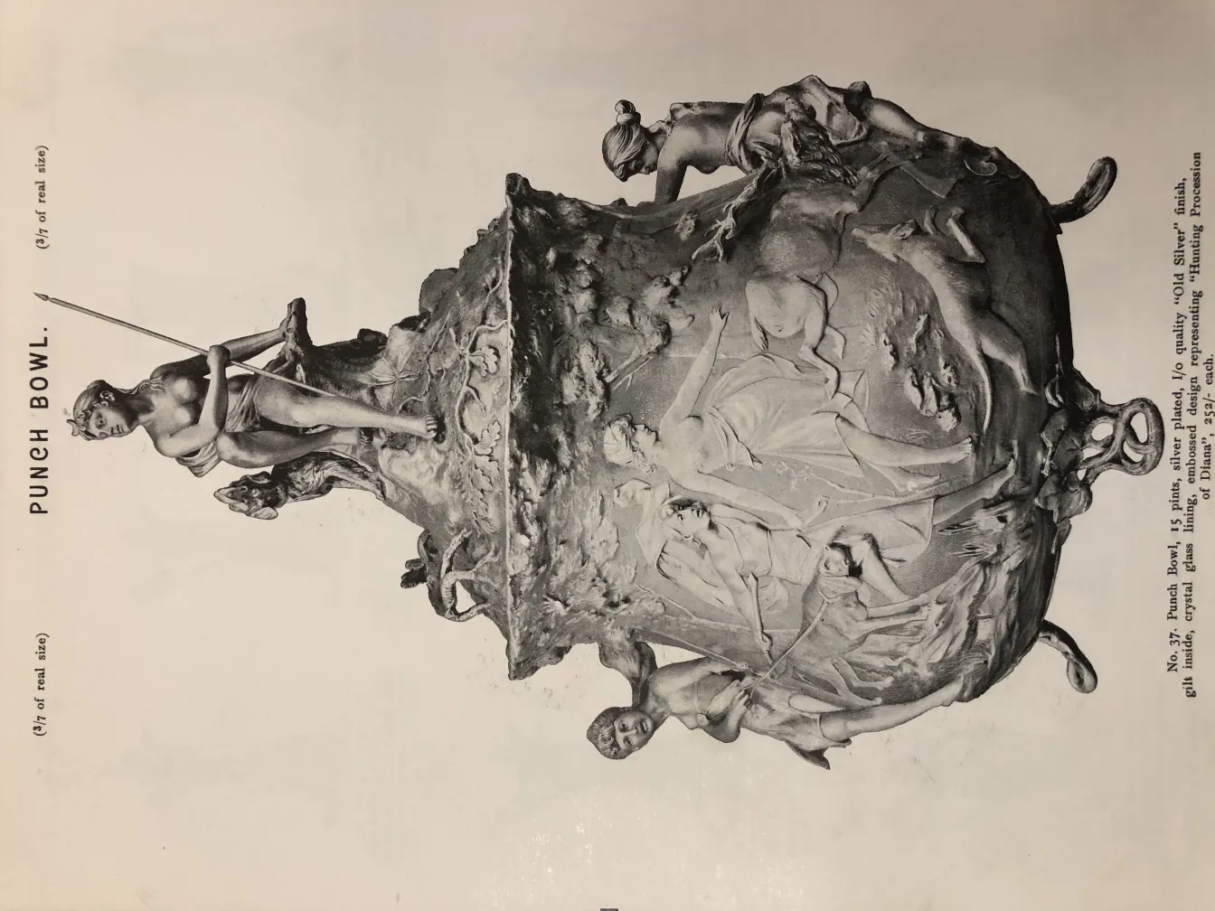 Antique WMF punch bowl with intricate decorations and relief figure.