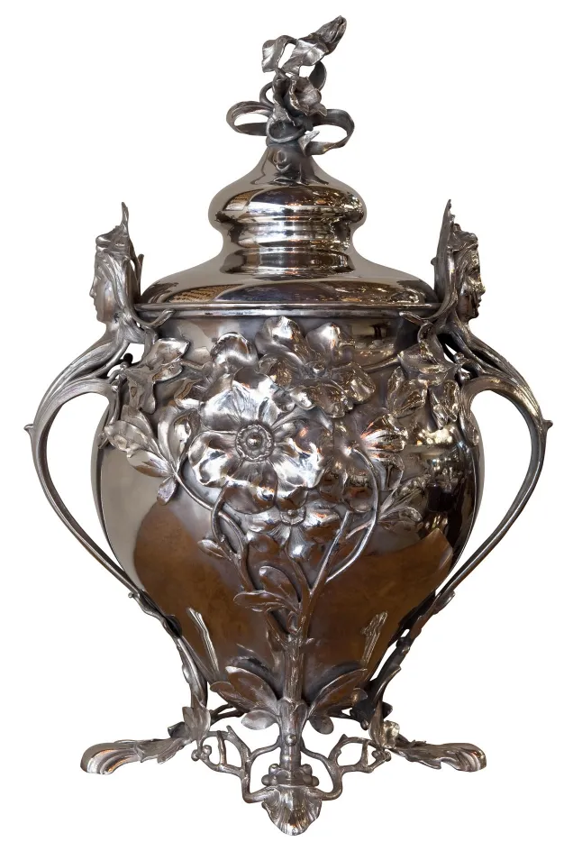 antique WMF punch bowl featuring floral details and ornamentation