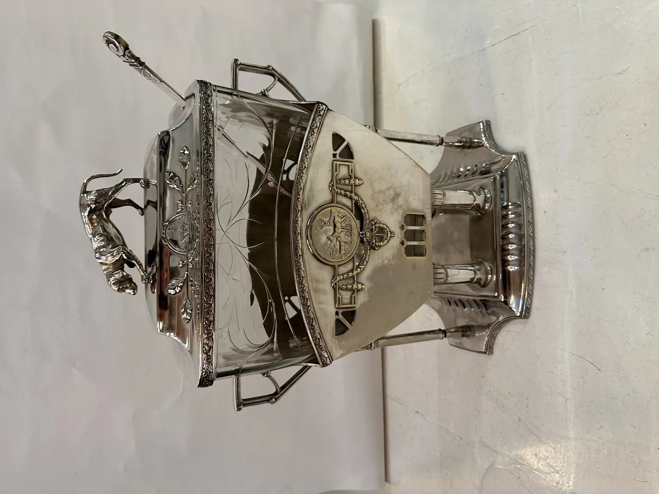 Antique WMF punch bowl featuring intricate design details