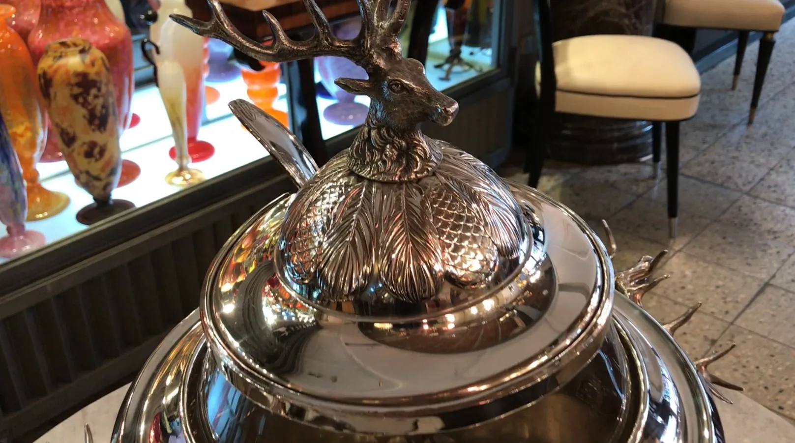 Antique WMF punch bowl with a beautiful design and deer figure.