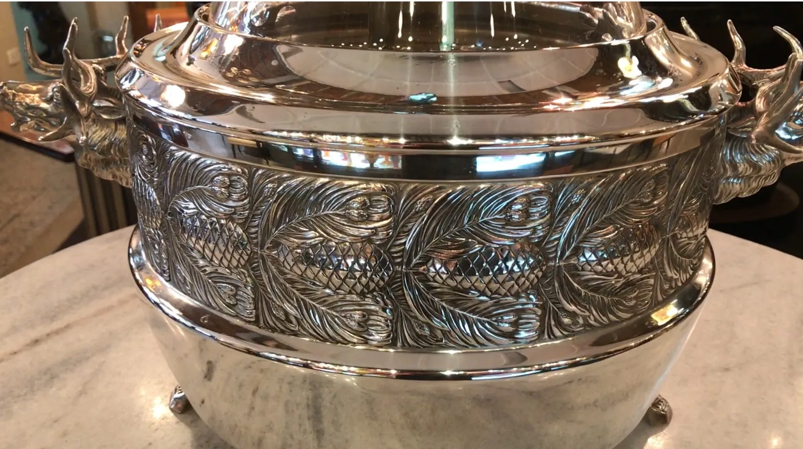 antique wmff punch bowl with decorative shapes on body and handles