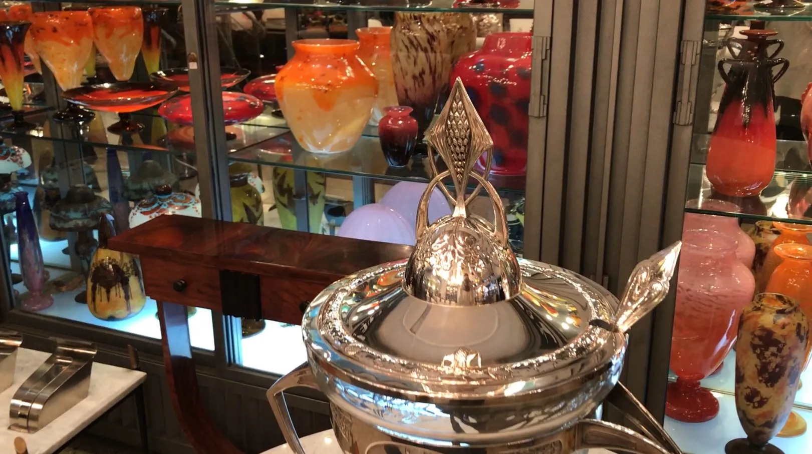 antique wmfr punch bowl with lid and elegant design, colorful background