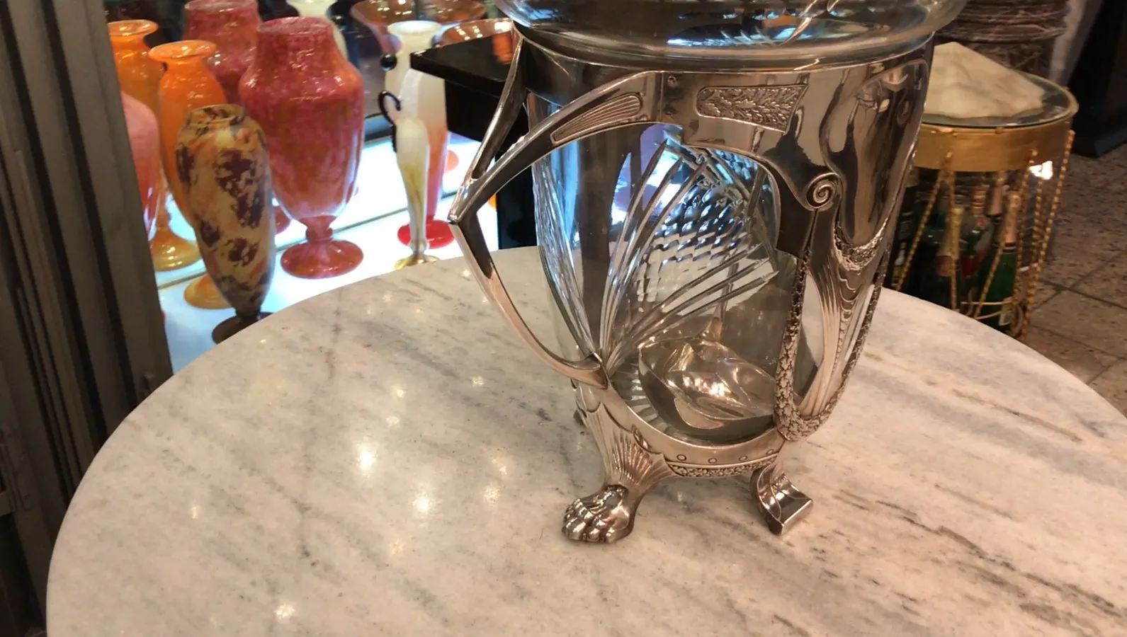 Antique WMF punch bowl with detailed handles and feet