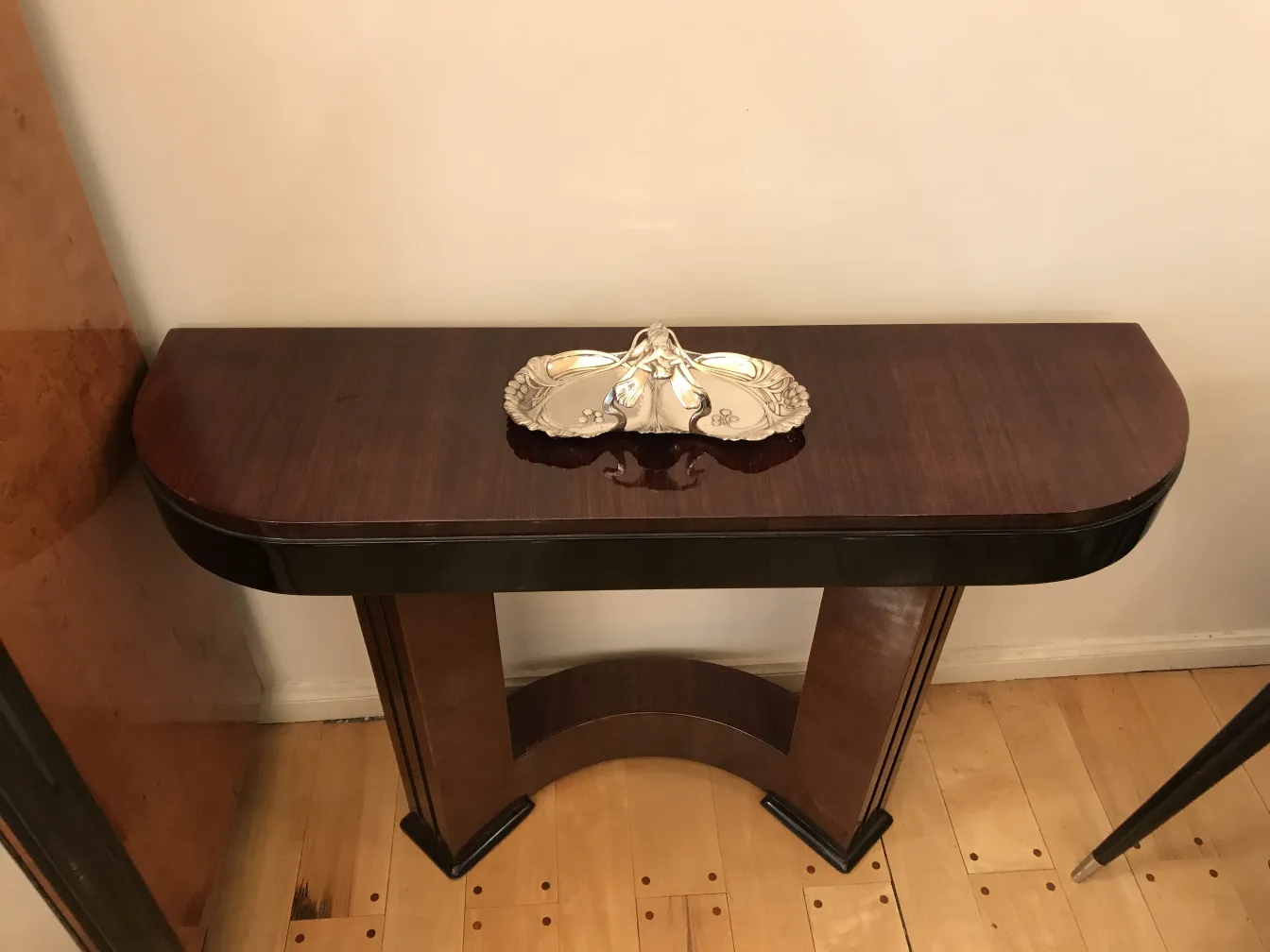 antique card tray wmf on a wooden console table