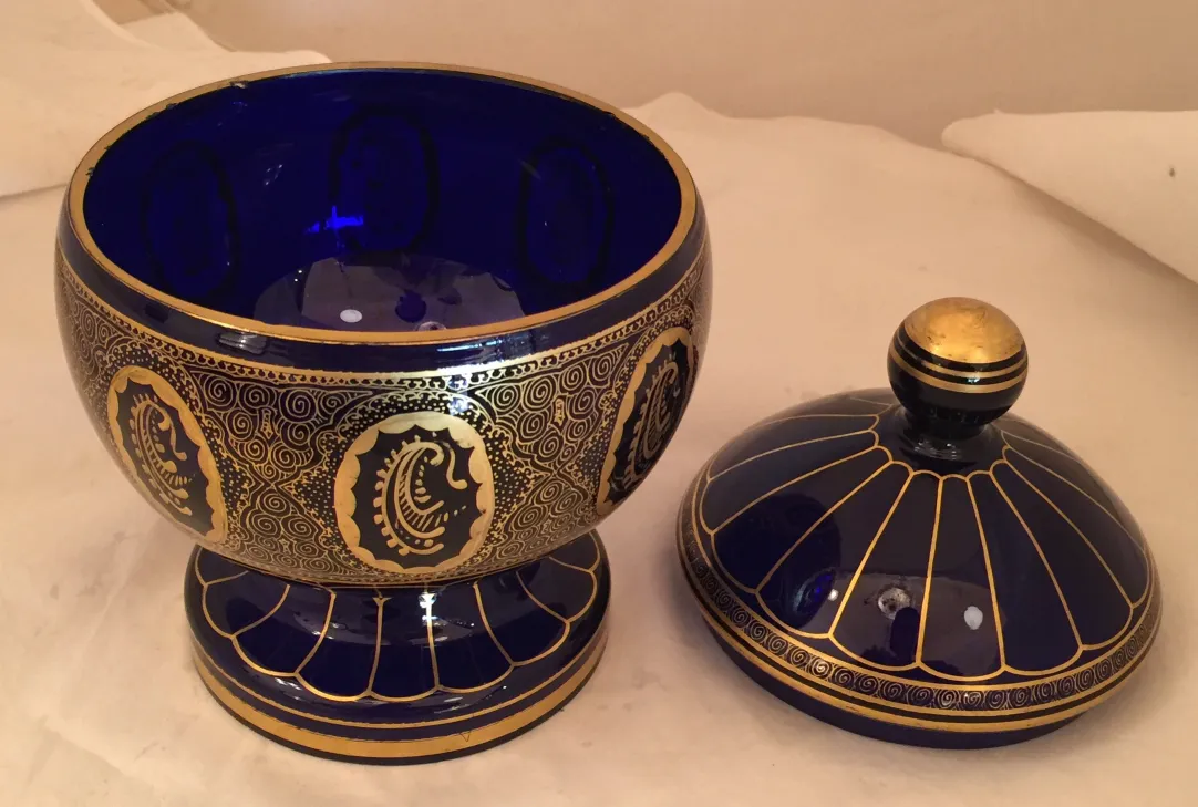 antique candy box with blue and gold design