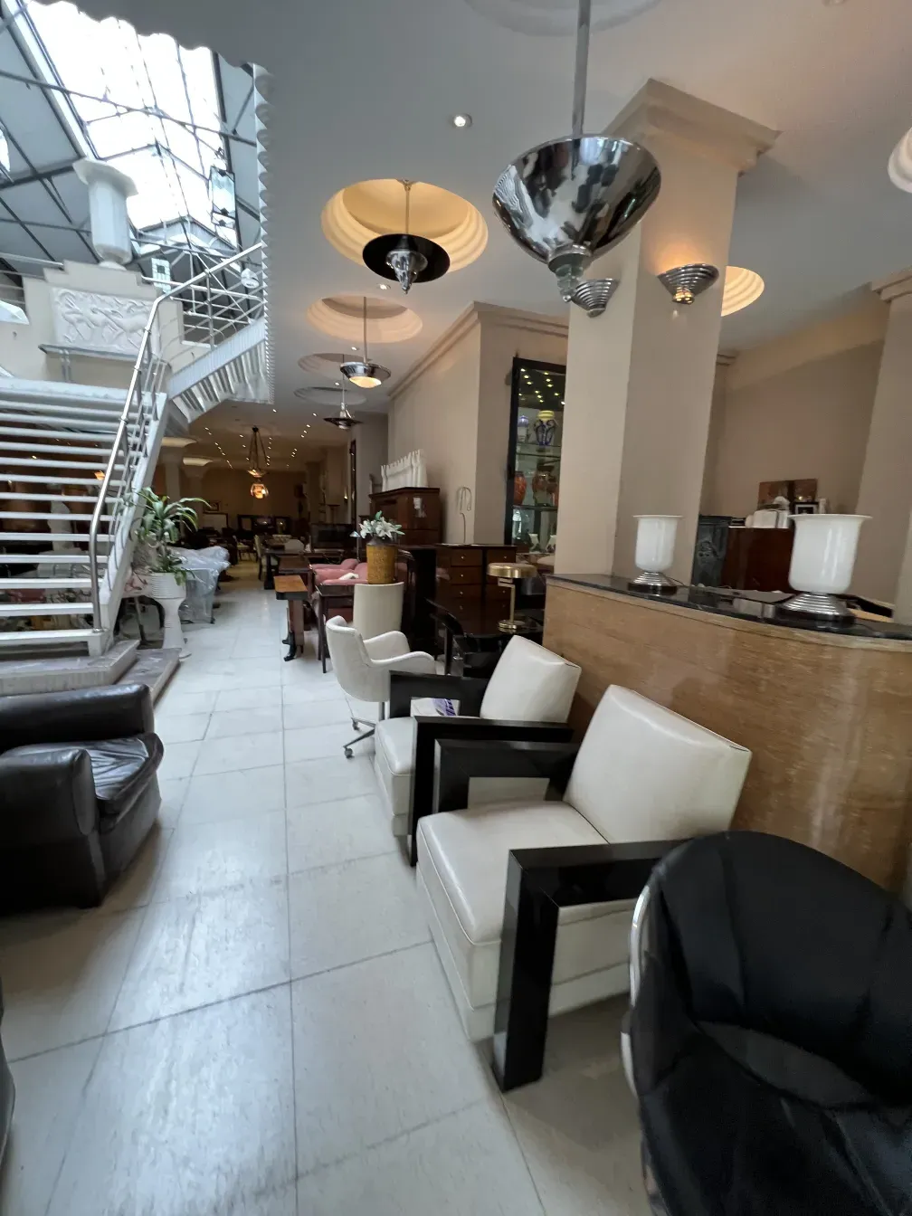 Setting with 2 antique armchairs and decorative details